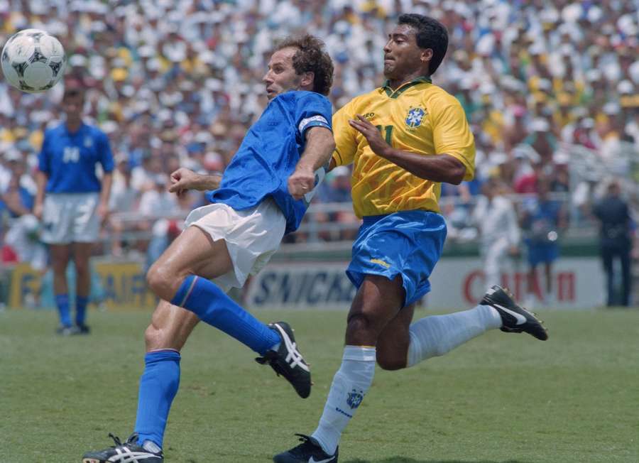 Baresi (L) competes with Brazil's Romario Baresi (L) competes with Brazil's Romario