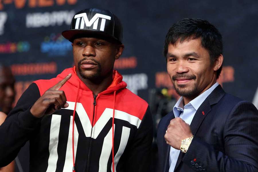 Floyd Mayweather (left) and Manny Pacquiao (right) pose before a match Floyd Mayweather (left) and Manny Pacquiao (right) pose before a match