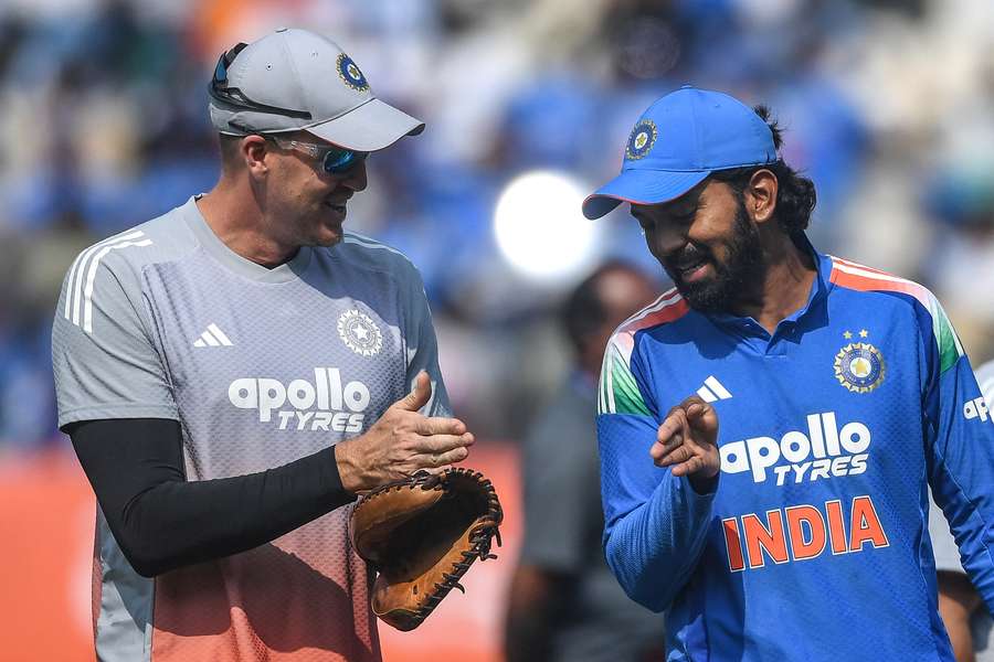 India's captain KL Rahul speaks with bowling coach Morne Morkel after winning the toss