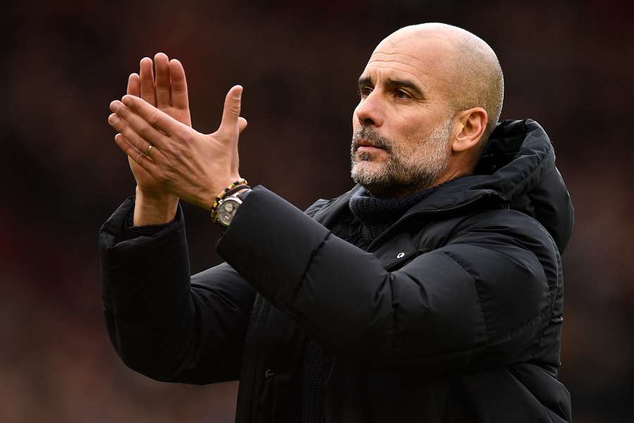 Pep Guardiola applauds the fans 