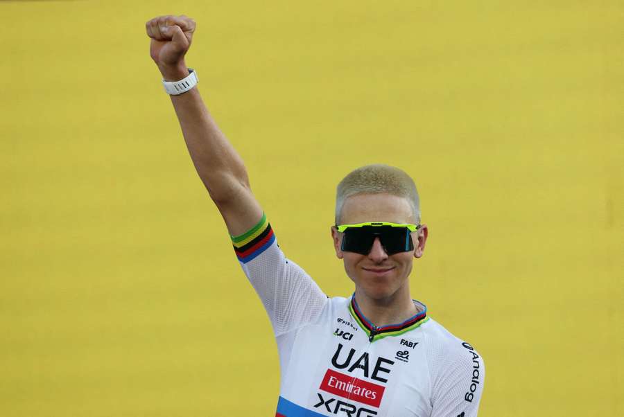 Tadej Pogacar salutes the crowd at the team presentation Tadej Pogacar salutes the crowd at the team presentation