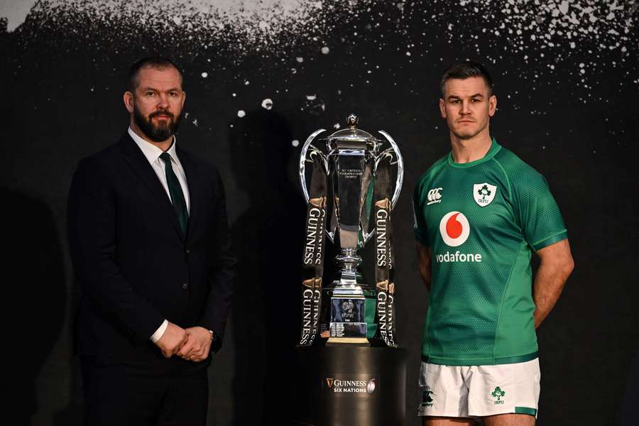 Ireland's head coach Andy Farrell and Ireland's captain Jonathan Sexton pose with the Six Nations trophy 