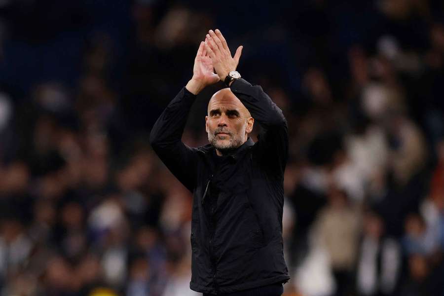 Pep Guardiola applauds the Manchester City after beating Real Madrid in the UEFA Champions League. Pep Guardiola applauds the Manchester City after beating Real Madrid in the UEFA Champions League.