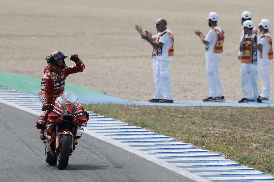 Ducati Lenovo Team's Francesco Bagnaia celebrates winning the race