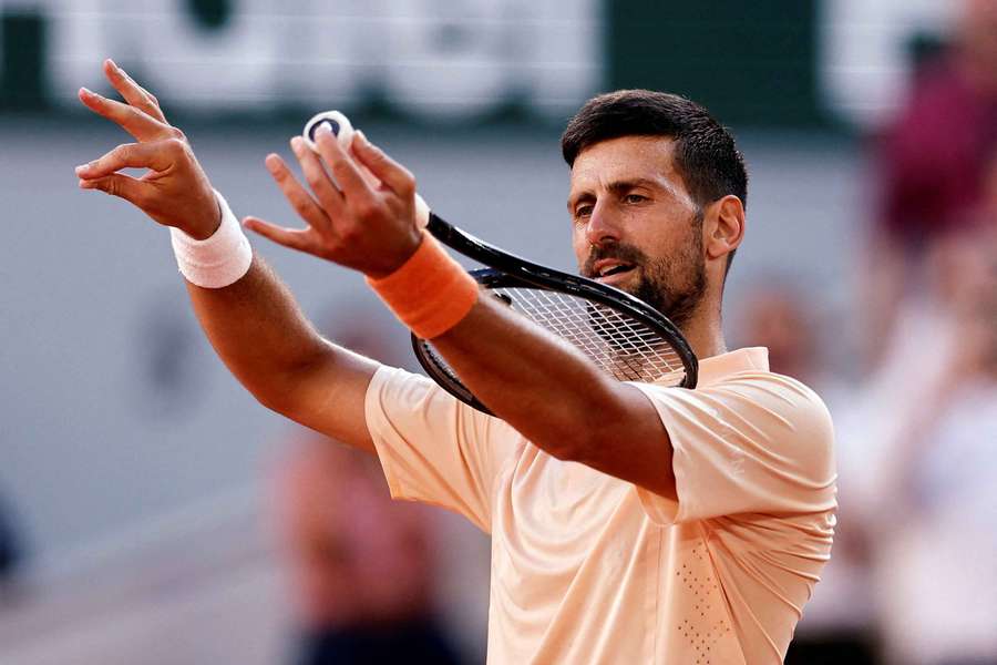 Djokovic celebrates his second-round victory Djokovic celebrates his second-round victory