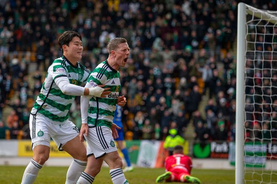 Callum McGregor of Celtic roars in celebration after his goal in the 67th minute 