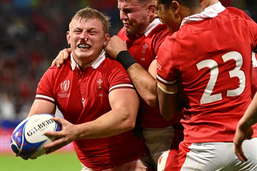 Wales' lock Adam Beard (C) celebrates at the end of the France 2023 Rugby World Cup Pool C match