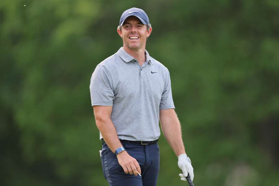 Rory McIlroy of Northern Ireland reacts to a shot