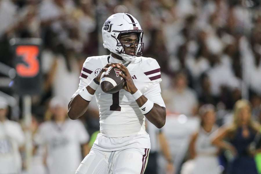 Mississippi State Quarterback Kamario Taylor looks downfield to make a pass against Missouri Mississippi State Quarterback Kamario Taylor looks downfield to make a pass against Missouri