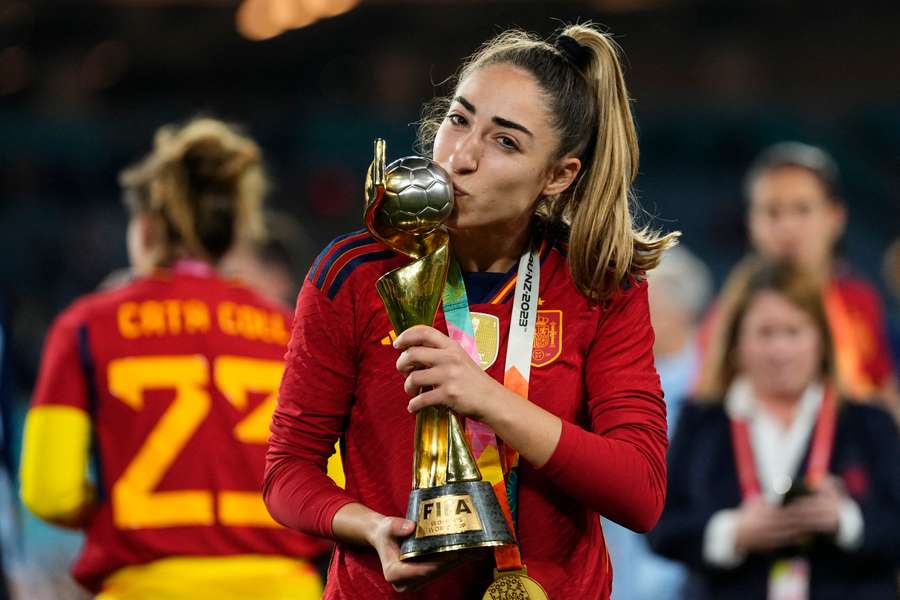 Olga Carmona of Spain and Real Madrid poses with the trophy after winning the FIFA Women's World Cup