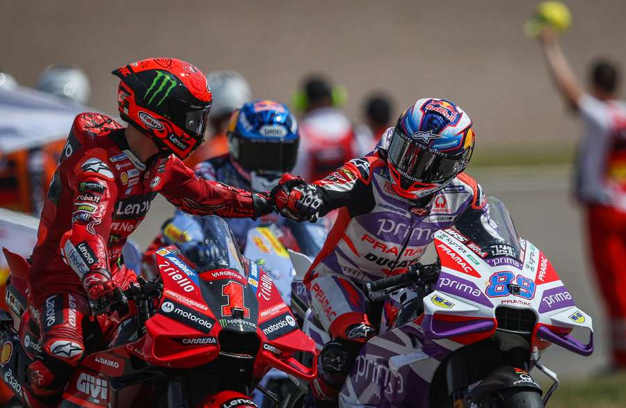 Pramac Racing rider Jorge Martin (R) celebrates after winning the sprint race with second-placed Ducati Lenovo rider Francesco Bagnaia