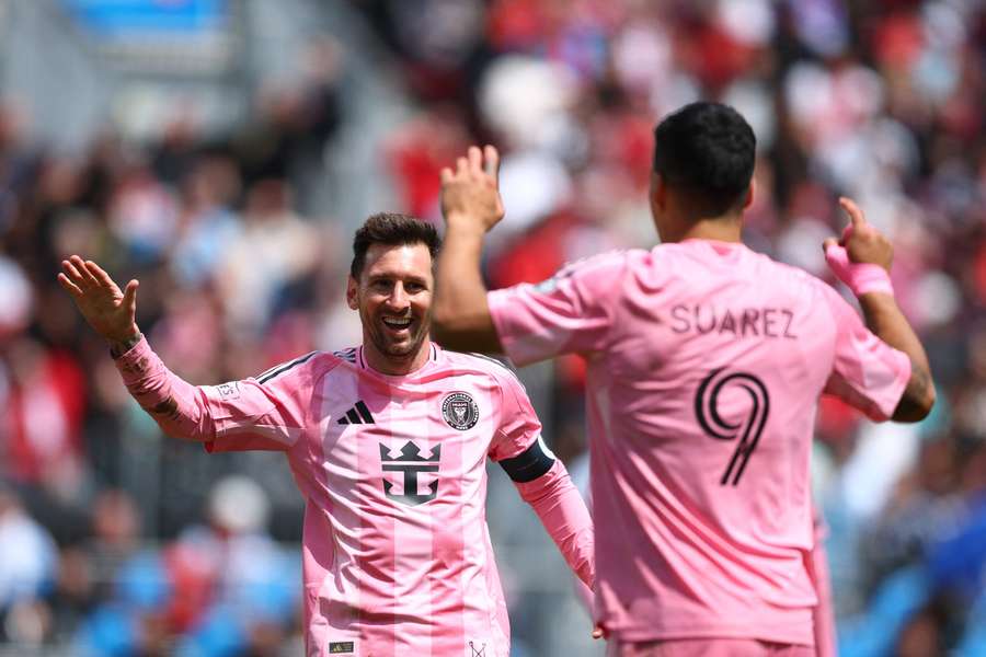 Luis Suárez celebrates scoring his team's second goal with Lionel Messi during the MLS match between Toronto FC and Inter Miami