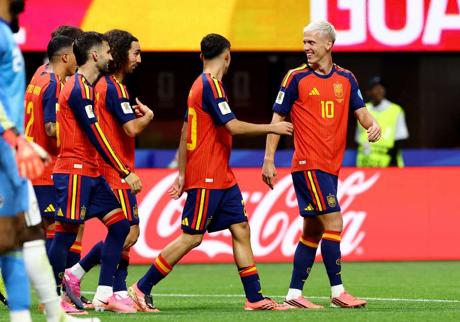 Spain's Marc Cucurella celebrates with Dani Olmo, Pedri and teammates after Saudi Arabia's Hassan Altambakti scores an own goal Spain's Marc Cucurella celebrates with Dani Olmo, Pedri and teammates after Saudi Arabia's Hassan Altambakti scores an own goal