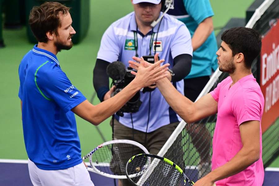 Carlos Alcaraz shakes hands with Daniil Medvedev after beating the Russian in the Indian Wells final to regain the world number one ranking