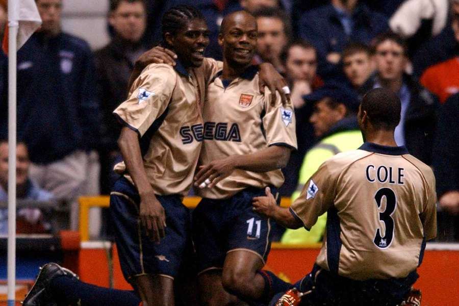 Nwankwo Kanu celebrates with Sylvain Wiltord and Ashley Cole as Arsenal won the Premier League at Old Trafford in 2002 Nwankwo Kanu celebrates with Sylvain Wiltord and Ashley Cole as Arsenal won the Premier League at Old Trafford in 2002