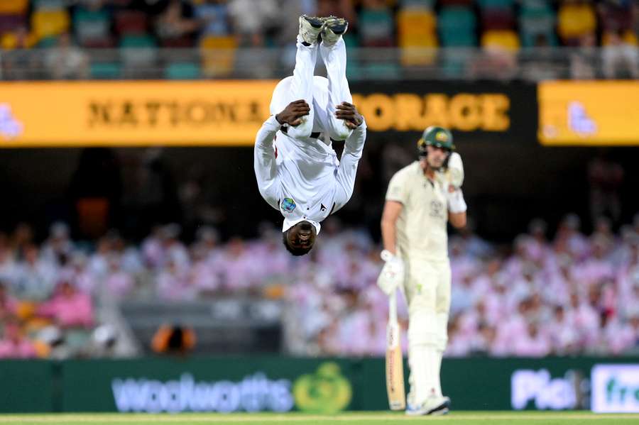 Kevin Sinclair of the West Indies celebrates taking the wicket of Usman Khawaja during the second Test in Brisbane