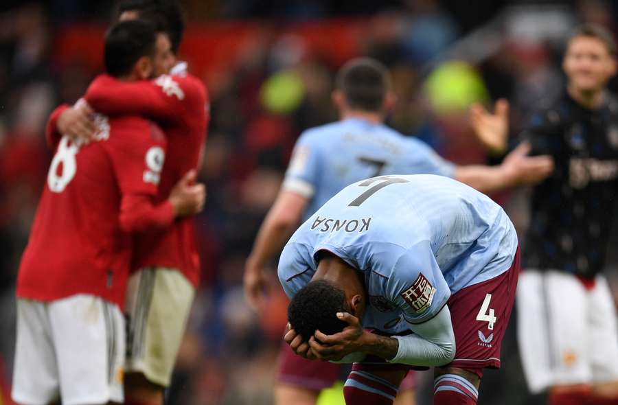 Aston Villa's English defender Ezri Konsa reacts at the end of the English Premier League football match between Manchester United and Aston Villa