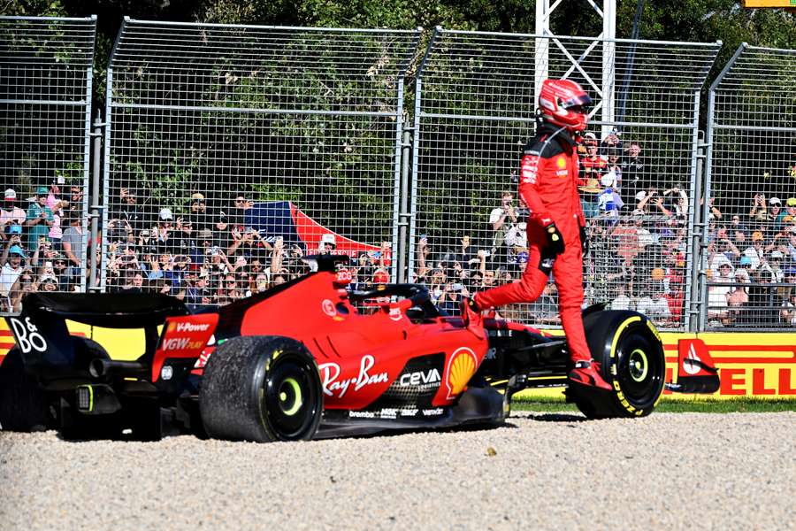 Ferrari's Monegasque driver Charles Leclerc jumps out of the car after a crash