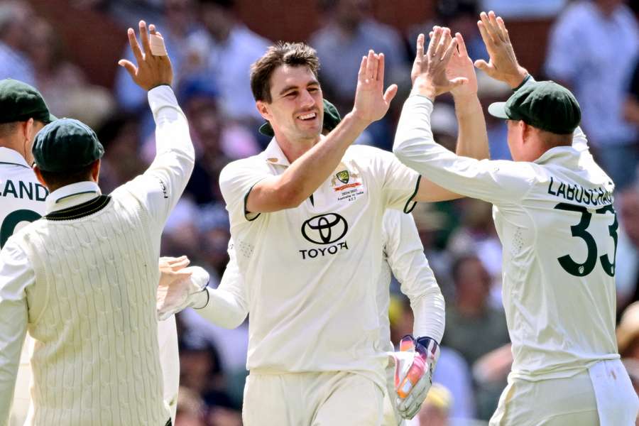 Australia's Pat Cummins celebrates taking a wicket