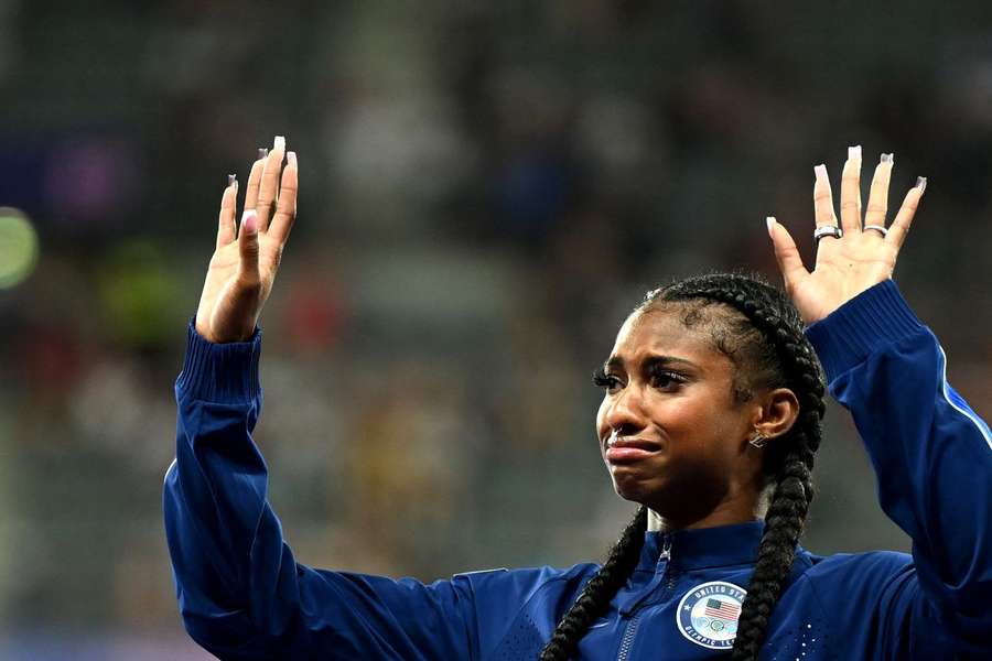 Masai Russell em representação dos Estados Unidos