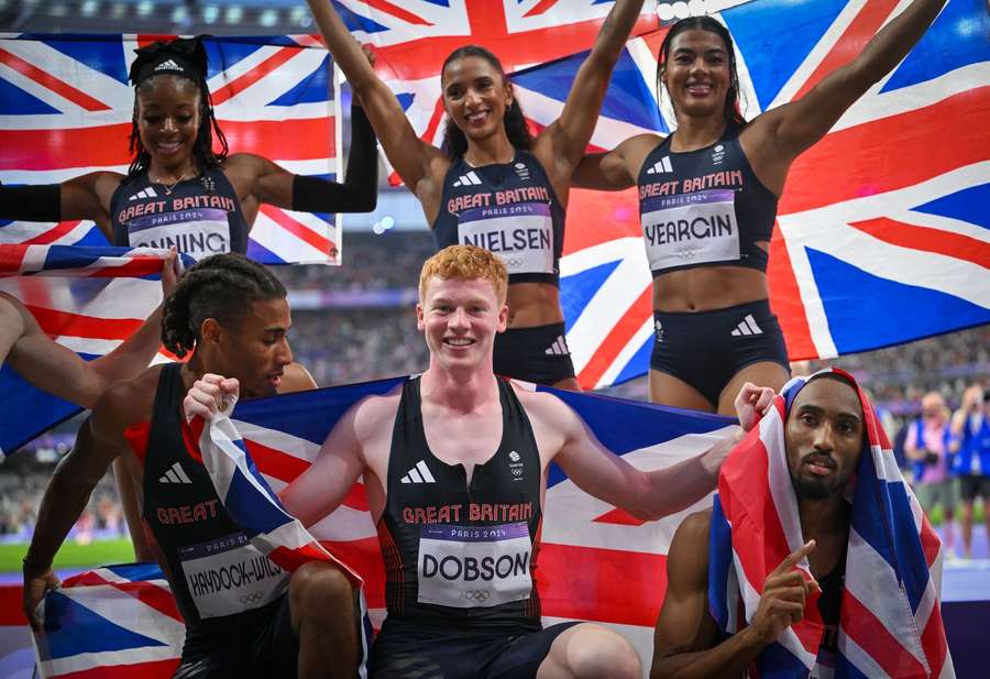 Great Britain's Charles Dobson (middle) celebrates as both the men and the women take bronze