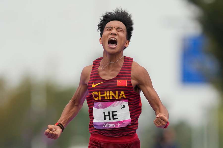 He Jie foi vencedor na Meia Maratona de Pequim, mas ficou sem a medalha