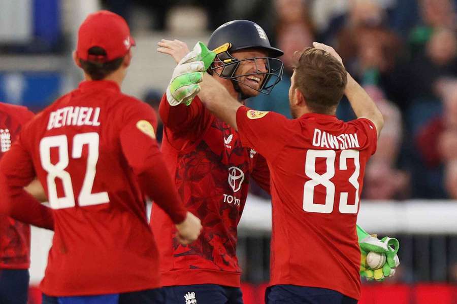 Liam Dawson celebrates with Jos Buttler after taking a wicket for England Liam Dawson celebrates with Jos Buttler after taking a wicket for England