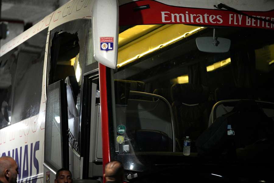 The bus of the Lyon soccer team is seen stoned before arriving at the Velodrome Stadium