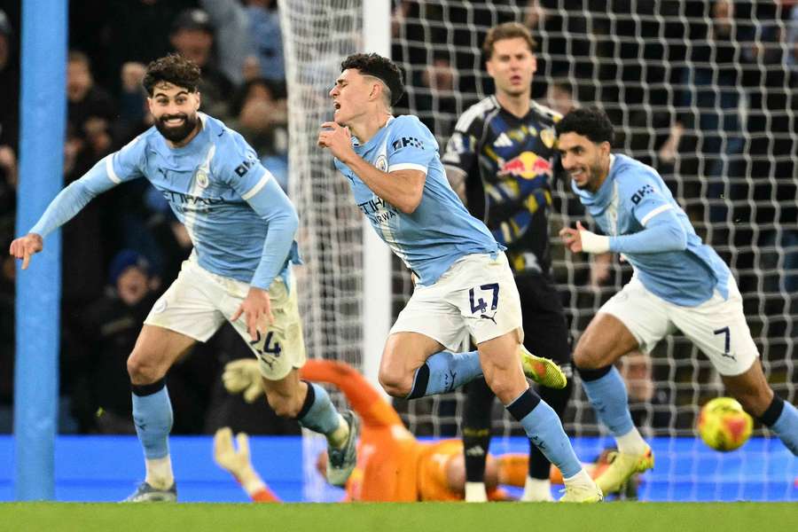 Phil Foden celebrates scoring Man City's third goal in the 91st minute Phil Foden celebrates scoring Man City's third goal in the 91st minute