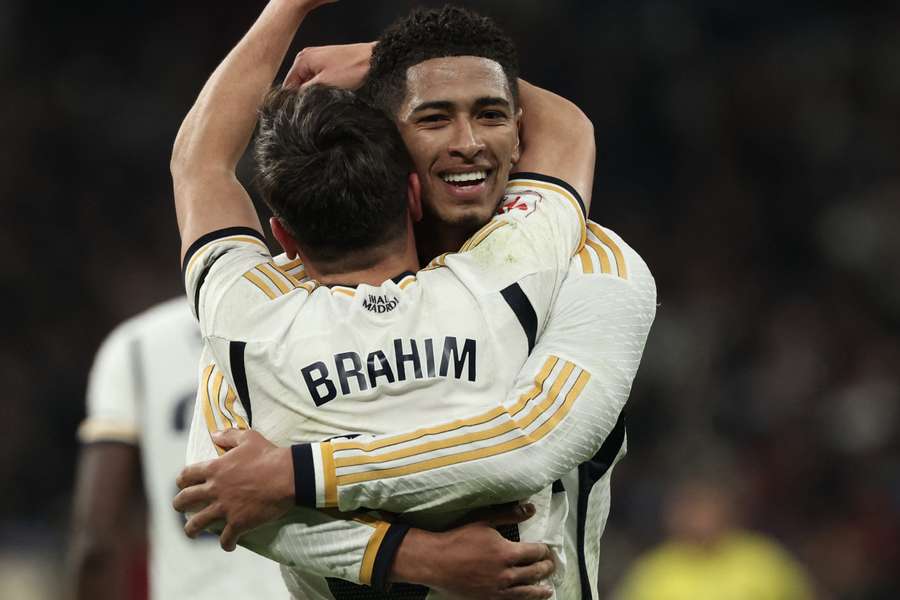 Brahim Diaz hugs Jude Bellingham after scoring the opening goal against Villarreal