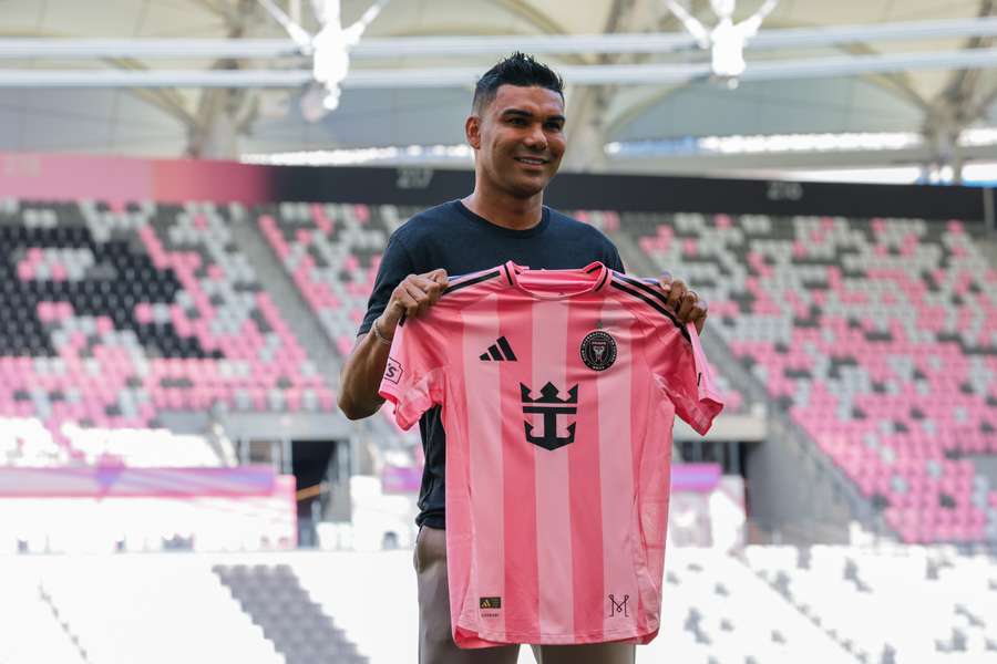 Casemiro poses with an Inter Miami jersey after joining the club.