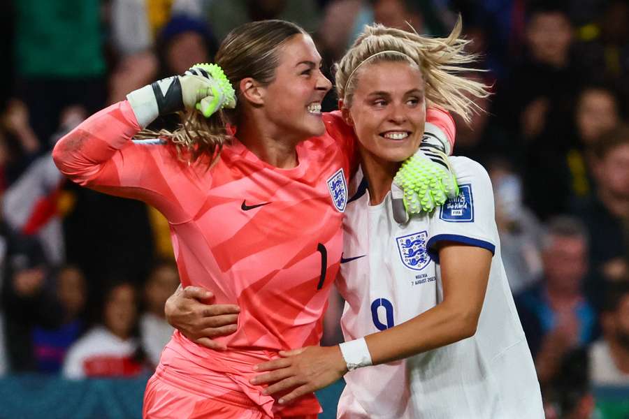 England's England's goalkeeper #01 Mary Earps and England's forward #09 Rachel Daly celebrate their victory