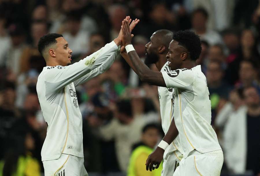 Real Madrid's Vinicius Junior celebrates scoring their second goal with Antonio Rudiger and Trent Alexander-Arnold