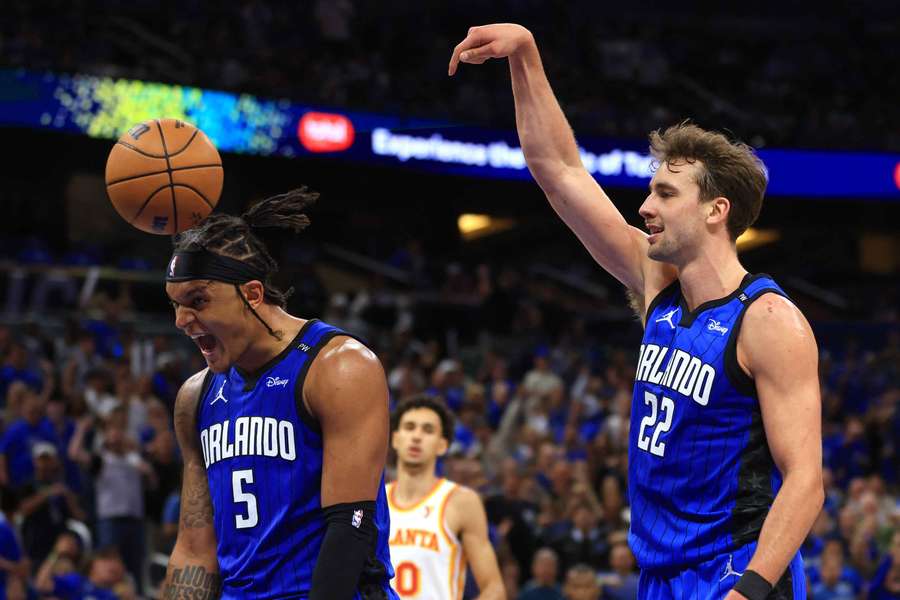 Paolo Banchero (left) and Franz Wagner (right) celebrating after a made basket against the Atlanta Hawks