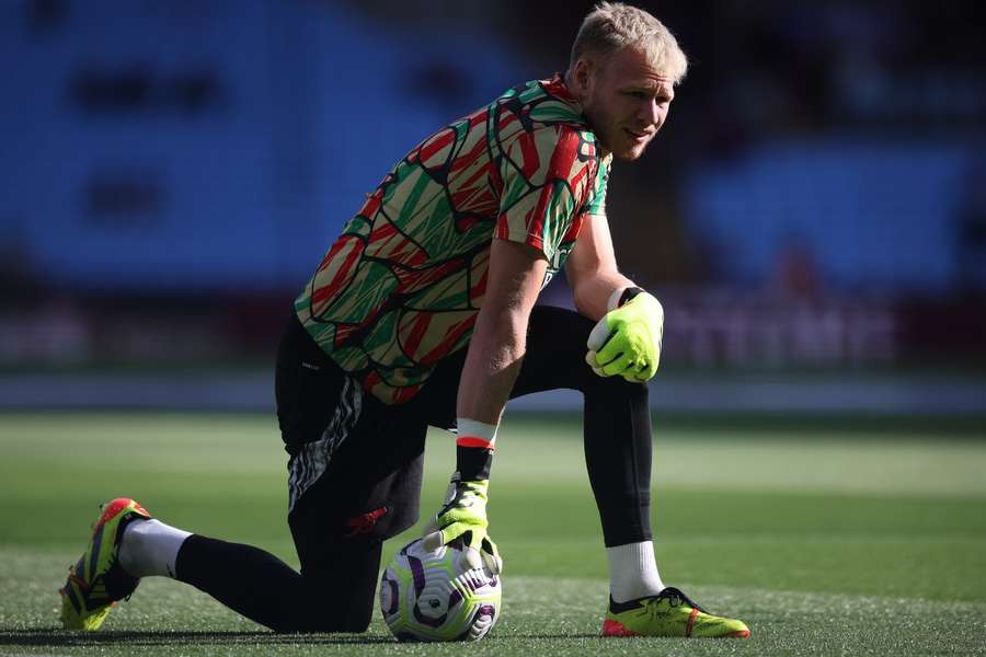 Goalkeeper Aaron Ramsdale of Arsenal warms up ahead of the English Premier League soccer match between Aston Villa and Arsenal 