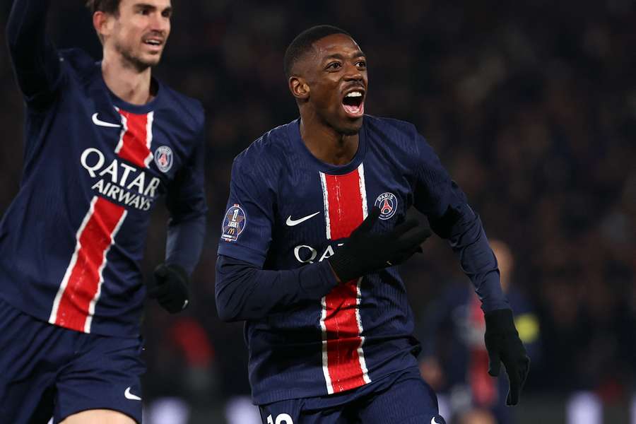 Paris Saint-Germain's French forward Ousmane Dembele celebrates scoring the opener