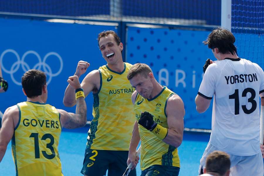 Blake Govers of Australia, Thomas Craig of Australia and Tom Wickham of Australia celebrate their third goal