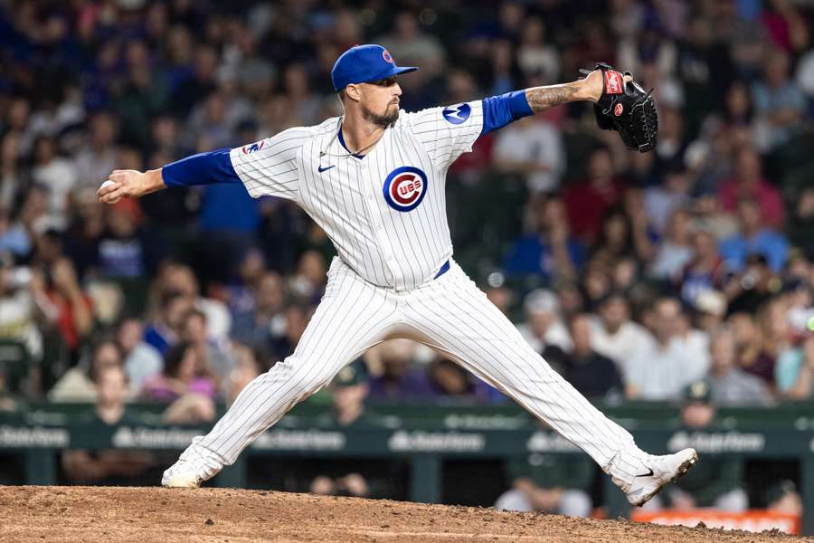 Shawn Armstrong about to deal a pitch in a game against the Athletics