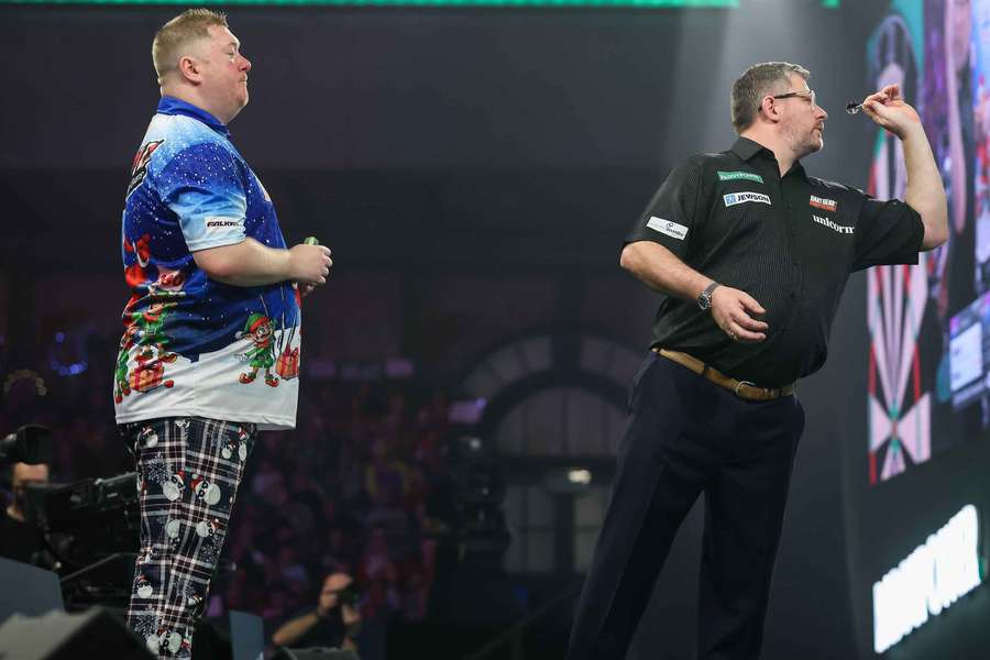 Evans (L) and Wade in action at Alexandra Palace Evans (L) and Wade in action at Alexandra Palace