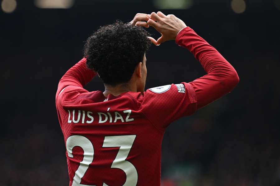 Liverpool's Colombian midfielder Luis Diaz celebrates after scoring their second goal during the English Premier League football match between Liverpool and Tottenham