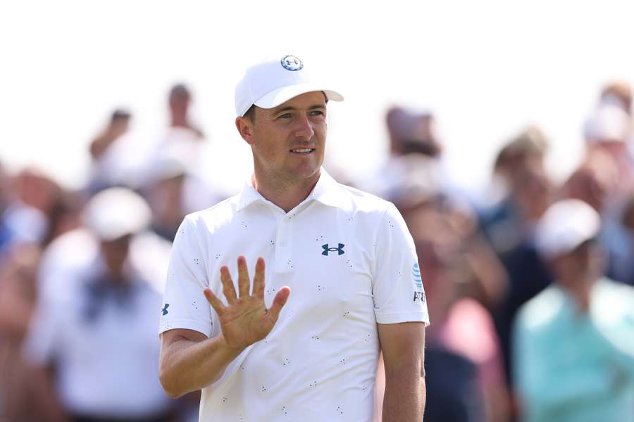 Jordan Spieth of the United States reacts on the third tee