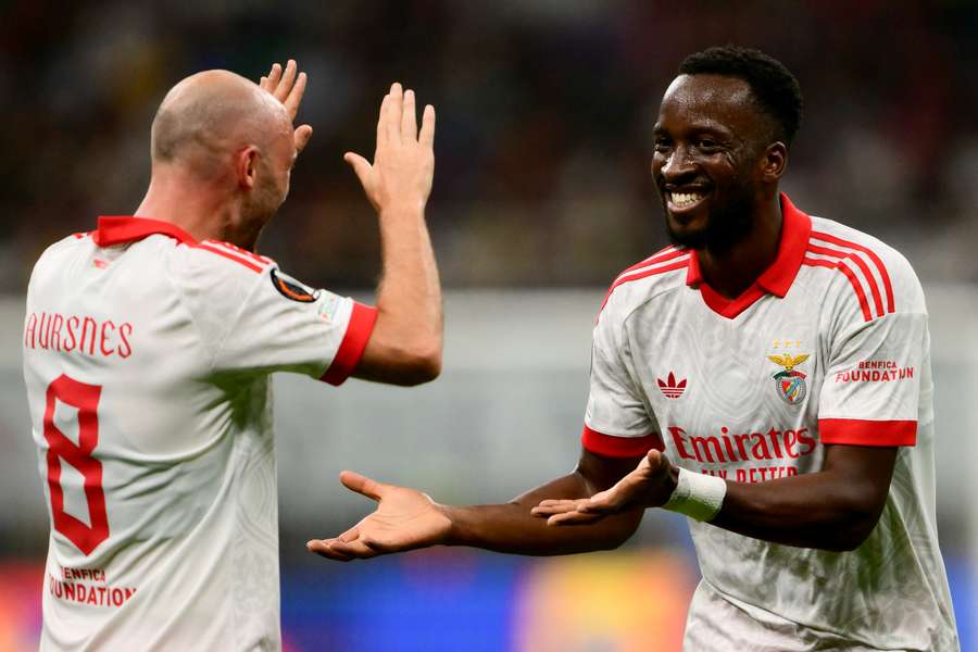 Benfica’s Dodi Lukebakio (right) celebrates after scoring his team's first goal in Milan