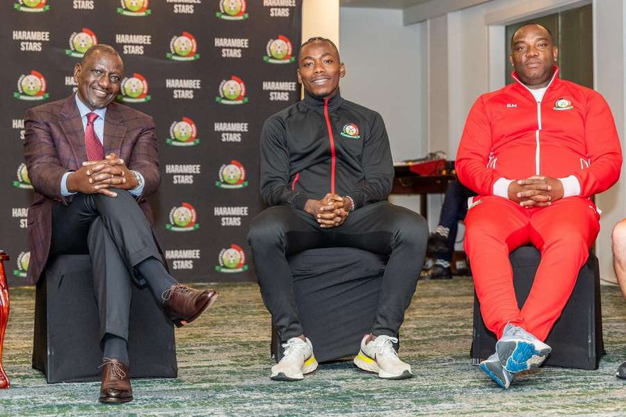 President Ruto, captain Aboud Omar and Harambee Stars coach Benni McCarthy President Ruto, captain Aboud Omar and Harambee Stars coach Benni McCarthy