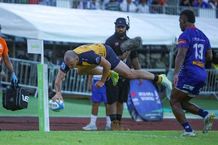 Western Force's Dylan Pietsch dots down in Fiji.