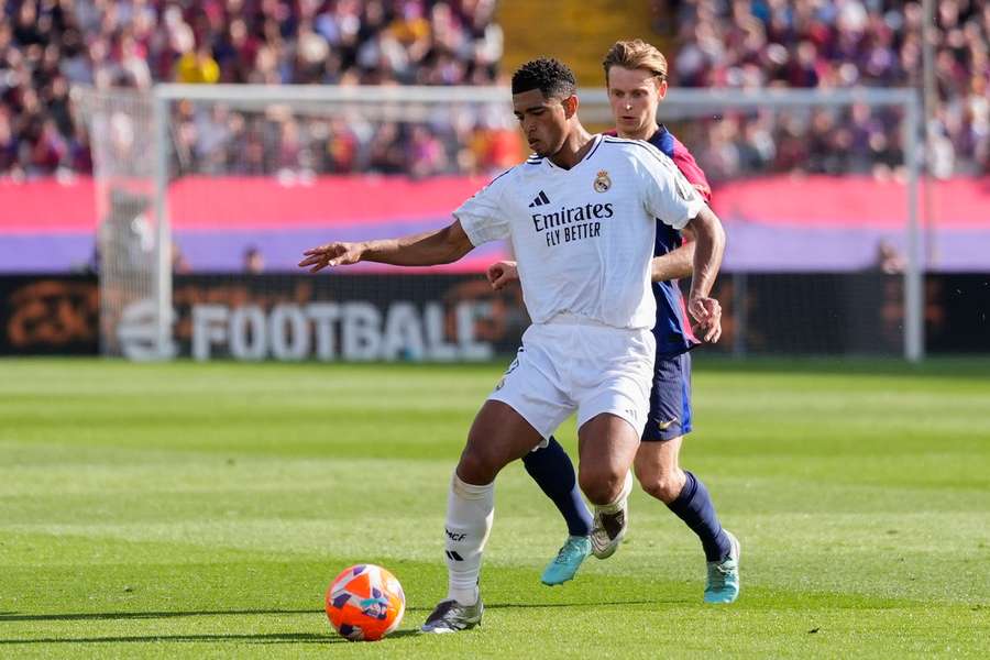 FC Barcelona's Frenkie de Jong in action against Real Madrid's Jude Bellingham FC Barcelona's Frenkie de Jong in action against Real Madrid's Jude Bellingham