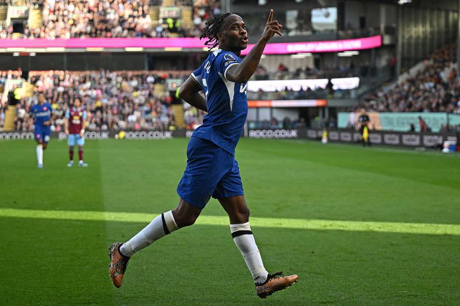 Chelsea's English midfielder #07 Raheem Sterling celebrates scoring the team's third goal