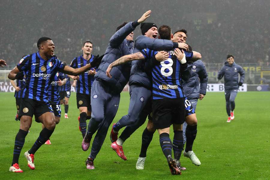Marko Arnautovic is mobbed by his Inter teammates after scoring against Lazio