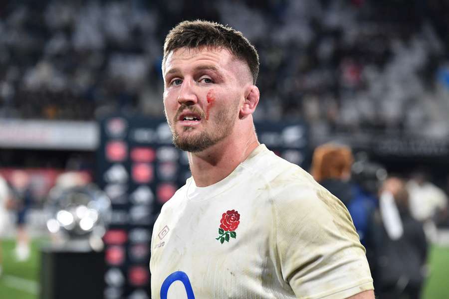 England's Tom Curry looks on