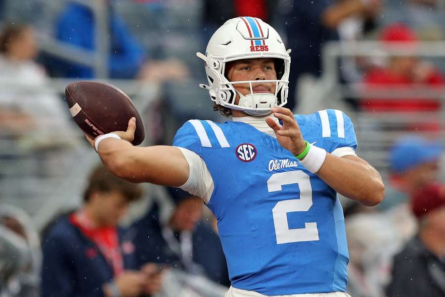 Ole Miss quarterback Jaxson Dart warming up before a game against the Georgia Bulldogs