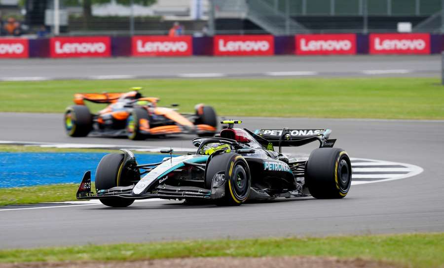 Hamilton in his Mercedes ahead of McLaren's Norris